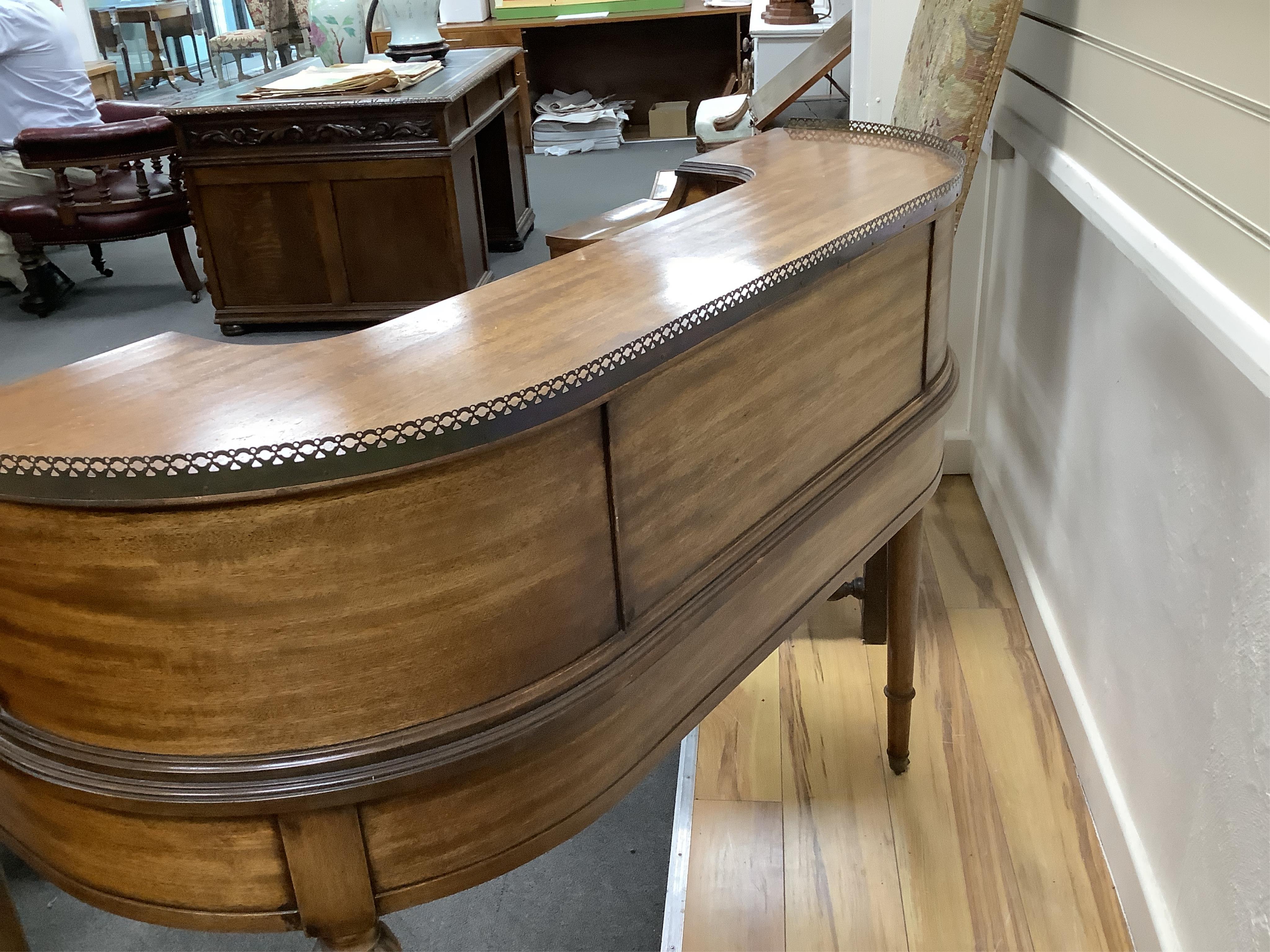 A reproduction mahogany Carlton House style desk, width 122cm, depth 62cm, height 98cm. Condition - fair to good